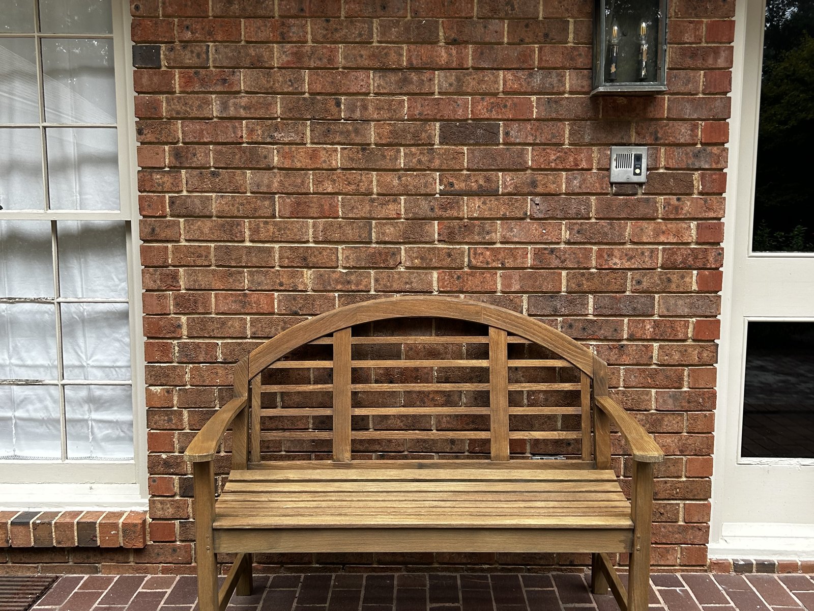 Restored teak porch bench, after