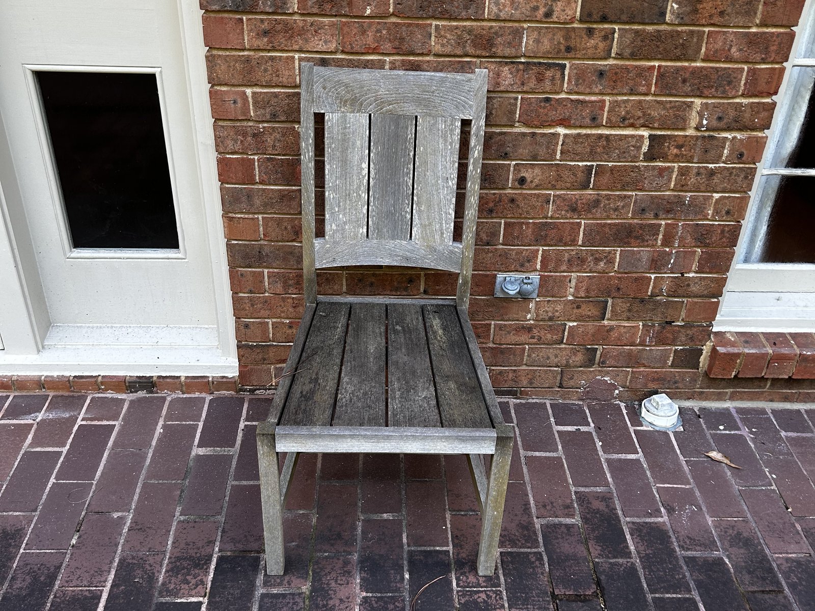 Weathered teak dining chair, before