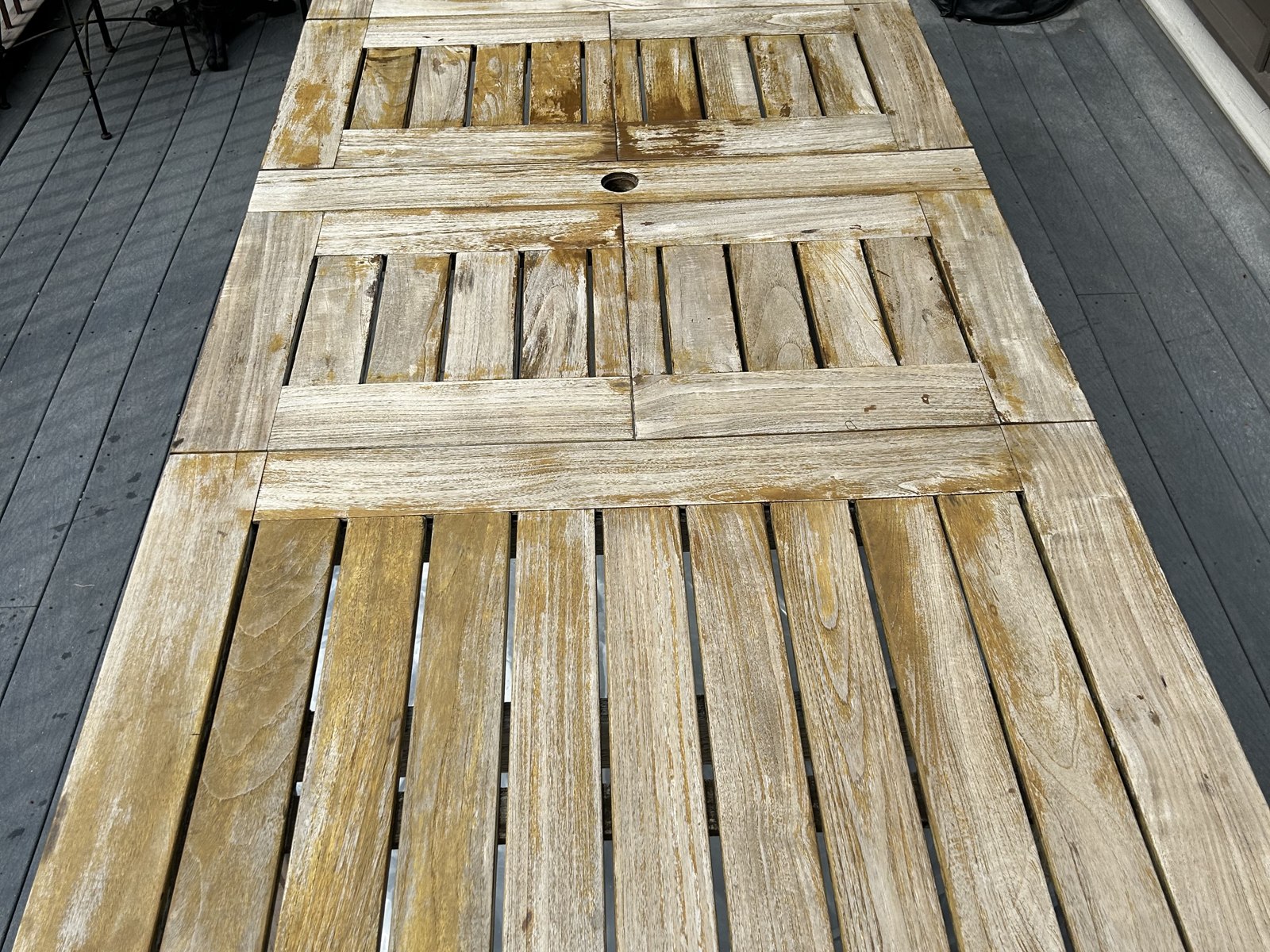 Weathered teak dining table, before